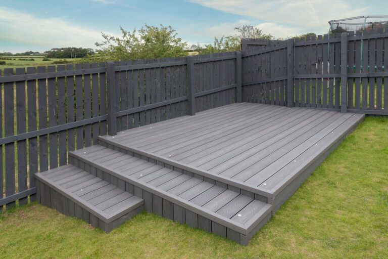 Composite deck with balustrade beside an artificial lawn, Perth