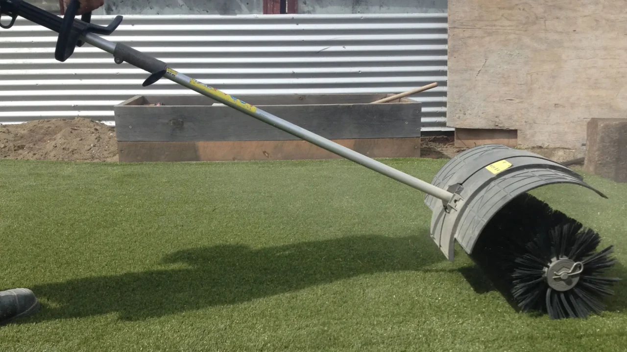 The Importance of Power Brooms for Synthetic Grass Maintenance
