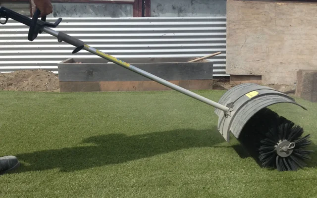 Using a powerbroom for artificial grass installation