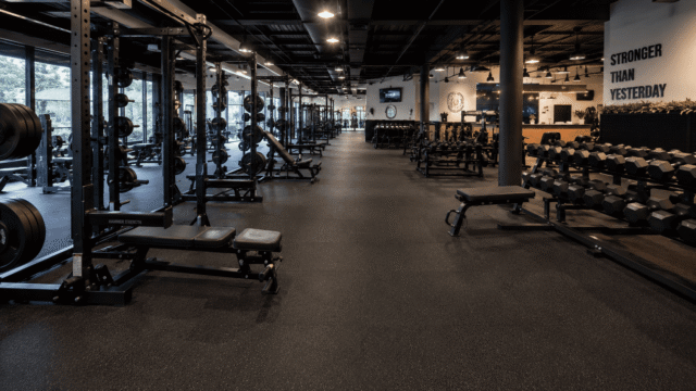 Luxury fitness facility featuring professional rubber flooring installation