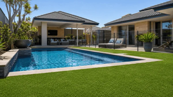 Artificial grass around swimming pool in Perth backyard